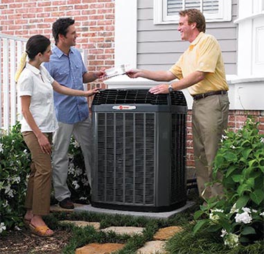 Premier AC & Heating LLC | Rock Hill, SC | couple talking to technician installing a trane unit